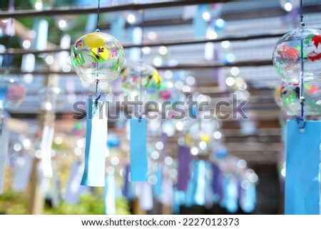 Wind chime or wind chime balcony  It is a wooden balcony with colorful wind chimes.  Countless hangings in Hikawa Shrine  Saitama Prefecture  Japan Royalty-Free Stock Photo #2227012373