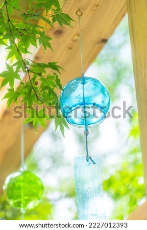 Wind chime or wind chime balcony  It is a wooden balcony with colorful wind chimes.  Countless hangings in Hikawa Shrine  Saitama Prefecture  Japan Royalty-Free Stock Photo #2227012393