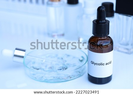 Glycolic acid in a bottle, chemical ingredient in beauty product, skin care products Royalty-Free Stock Photo #2227023491