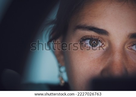 Ring light reflecting in woman's eye, face close up Royalty-Free Stock Photo #2227026763
