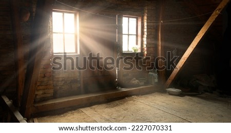 Rusty brown creepy scary past age big empty farm under roof lodge wall dim hole shine glow lit white day sky sun beam ray view scene. Dusty city ruin ceil messy cellar floor text space shadow backdrop Royalty-Free Stock Photo #2227070331