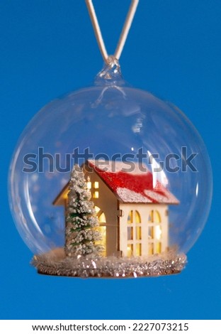 Christmas tree glass bauble lit up
