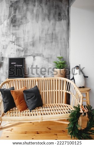 Christmas interior with tree and penguin