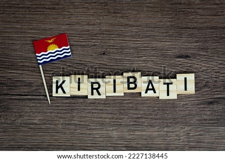 Kiribati - wooden word with kiribatian flag (wooden letters, wooden sign)