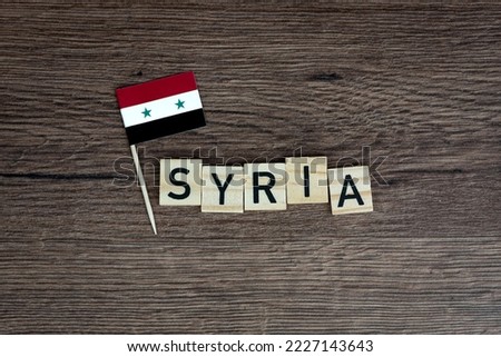 Syria - wooden word with syrian flag (wooden letters, wooden sign)