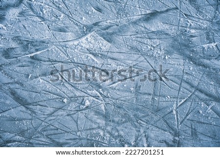 Blue ice in skate scratches