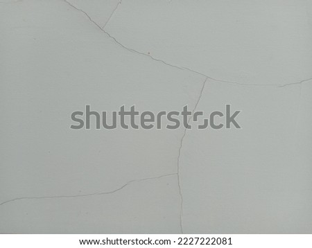 The horizontal picture of the wall shows cracks and cracks in the surface. Caused by the mistake of the mixture of mortar or Not up to the standard of construction