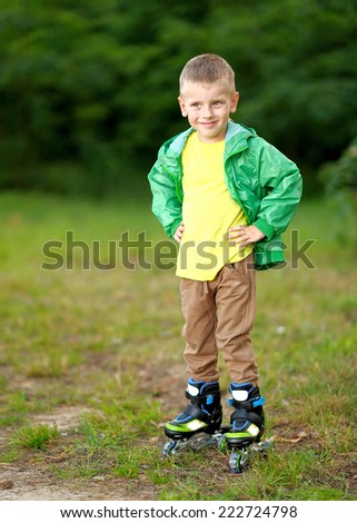 Portrait of cute little boy  in summer 