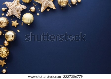 Stylish Blue Christmas background with gold stars, balls, confetti. Elegant Christmas greeting card, banner, party invitation card template.