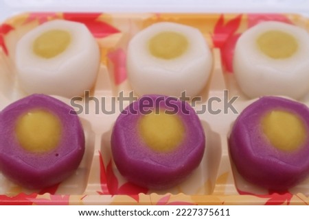 Close up of Japanese white and purple Japanese sweets