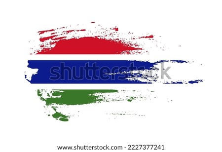 Grunge brush stroke flag of Gambia with painted brush splatter effect on solid background