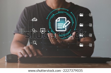 Online documentation database and process automation to efficiently manage files, knowledge and documentation in enterprise with ERP, Document Management System (DMS). Corporate business technology. Royalty-Free Stock Photo #2227379035