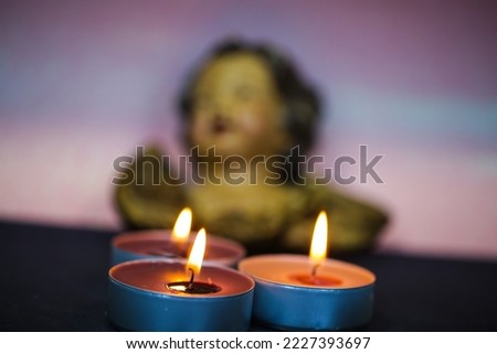 Candles with angels in the background, Christmas card, postcard