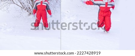 the child is very warmly dressed in red overalls. snowy winter. child playing outside