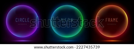 Collection of glowing neon lighting round lines on dark background. Set of blue, red-purple, green illuminate frame design. Abstract cosmic vibrant color circle backdrop. Top view futuristic style.