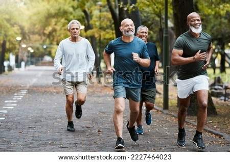 Senior, man group and running on street together for elderly fitness and urban wellness with happiness. Happy retirement, smile and runner club in workout, diversity and teamwork in park for health Royalty-Free Stock Photo #2227464023