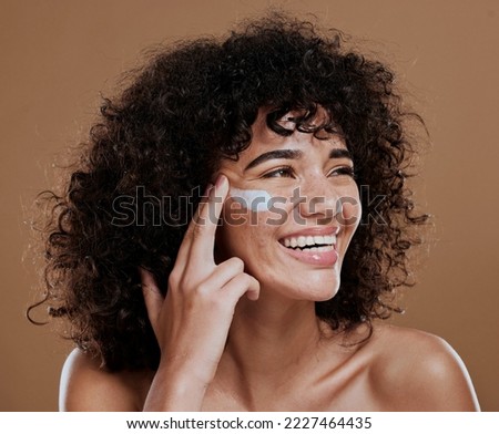 Black woman, facial cream and skincare wellness of happy face skin glow and sunscreen. Cosmetic, collagen and dermatology lotion of a woman model with a smile from natural cosmetics treatment Royalty-Free Stock Photo #2227464435