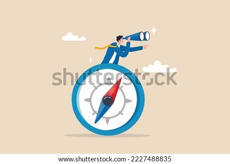 Business compass guidance direction or opportunity, make decision for business direction, finding investment opportunity, leadership or visionary concept, businessman with binocular and compass.