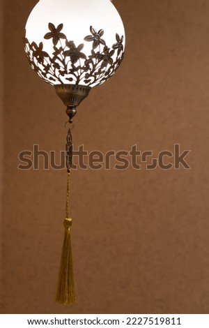 Beautiful Moroccan or turkish style light lamp, hanging lantern at home. Vertical banner