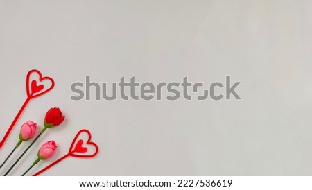 white background with love decoration and rose buds