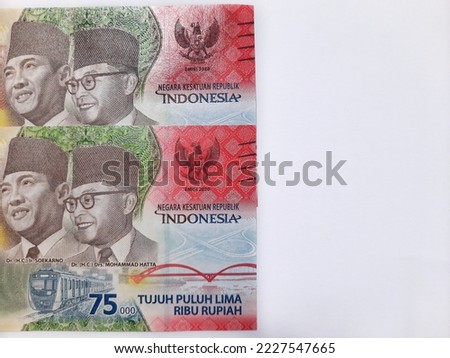 Indonesian rupiah currency. Seventy five thousand rupiah. Special edition for 75 years of Indonesian independence. 