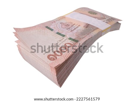 New Thai Banknote 1000 baht stacking isolated on white background. This has clipping path . ( Photo stacking full depth field focus full sharpen) Royalty-Free Stock Photo #2227561579