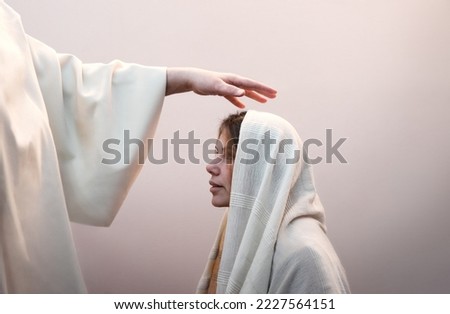 Close up old holy jew male apostl father Lord king hold arm abov give oil cure ill sick white rite vow win life Choose call young lady face beg ask help joy hope retro biblic happy wed love bride veil Royalty-Free Stock Photo #2227564151