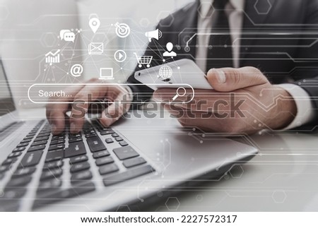 Business person with gadget and digital icons