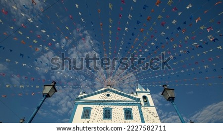 Church Nossa Senhora Da Ajuda, in Ilha Bela, north coast of Sao Paulo, adorned with flags, typical of the June Festivals. Brazil
