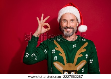 Photo of cheerful funny person hand fingers demonstrate okey symbol isolated on red color background