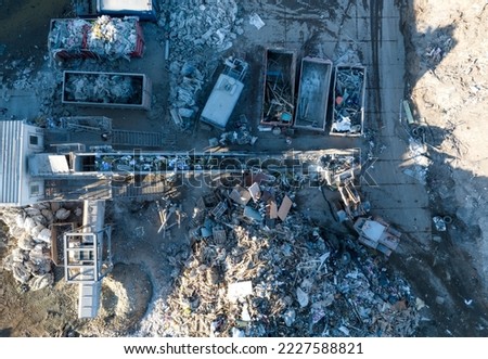 Landfill with Construction waste (CDW). Trash disposal for recycling and re-use. Recycling of Construction waste or debris. Secondary raw. Wood Waste Recycling.
 Royalty-Free Stock Photo #2227588821