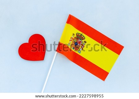 Flag of Spain with heart sign. Travel visa and citizenship concept