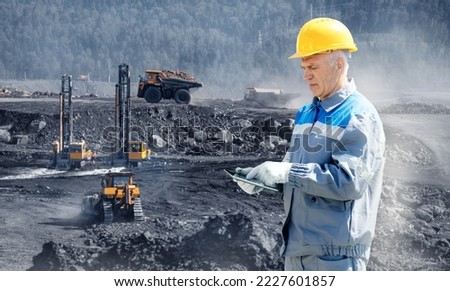 Preparation boring machines of site for blasting, mineral exploration. Open pit mine industry. Royalty-Free Stock Photo #2227601857