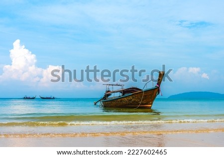 Beach and sea with blue sky and cloud at Railay beach Thailand. Tropical sea travel, holiday vacation concept image.