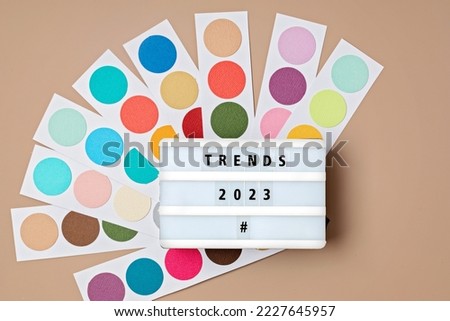 Lightbox with text trends 2023 and color palettes. Popular color tendencies and trends for new year idea