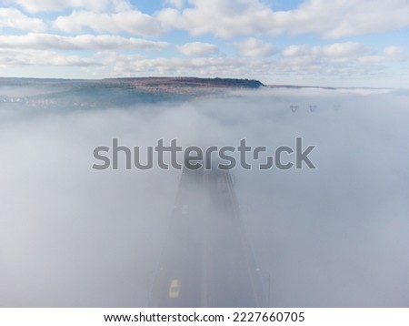 Aerial top view of the Asparuhov bridge in the fog in the morning, Varna, Bulgaria