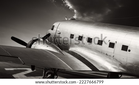 historical aircraft on a runway Royalty-Free Stock Photo #2227666799