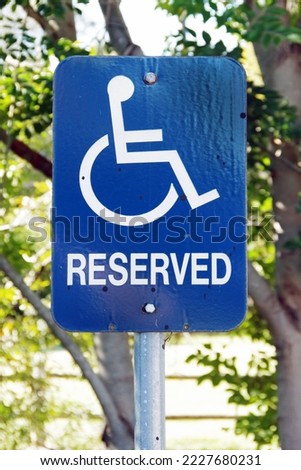 RESERVED for disabled parking sign