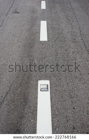 road stud with white reflector