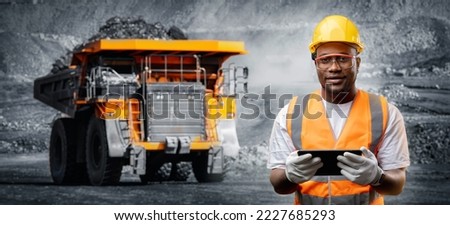 Open pit mine industry, big yellow mining truck for coal anthracite. Royalty-Free Stock Photo #2227685293
