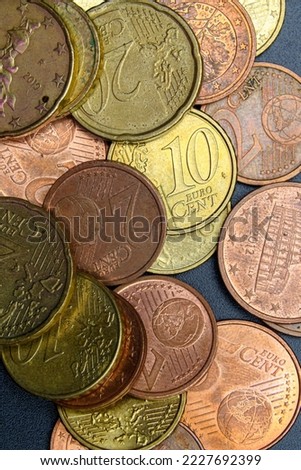 Group of euro cent coins, 1,2,5,20,50, close up view, black background	 Royalty-Free Stock Photo #2227692399