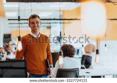 Photo portrait of a manager working in a modern company dealing with digital marketing Royalty-Free Stock Photo #2227724131