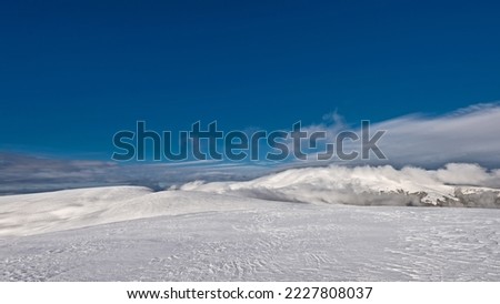 Winter mountain landscape. Mountain plateau covered with snow.