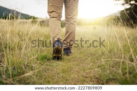 mens footsteps on the trail Royalty-Free Stock Photo #2227809809