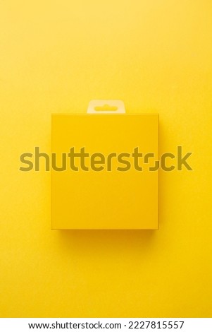 Yellow packaging box on yellow color background