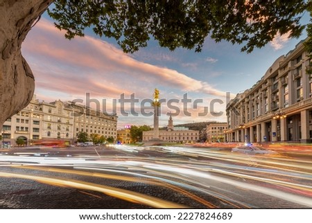 View of Freedom Square, Tbilisi, Georgia with movement of car light during twilight Royalty-Free Stock Photo #2227824689