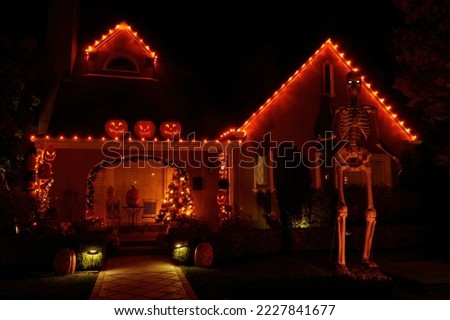 Halloween Jack-o-lanterns and Skeleton Decorating House in California