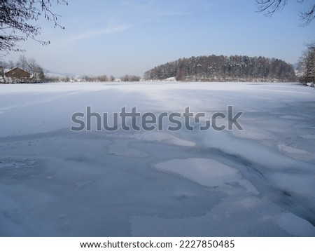Snowy winter atmosphere along the artificial reservoir Gübsensee (Guebsensee or Gübsen Lake) above the canyon of the river Sitter - Canton of St. Gallen, Switzerland (Schweiz)