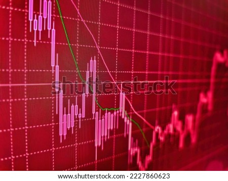 Share price quotes. Bullish point, Bearish point trend of graph. Trading on the currency market Forex. Financial graph on night city scape with tall buildings background double exposure