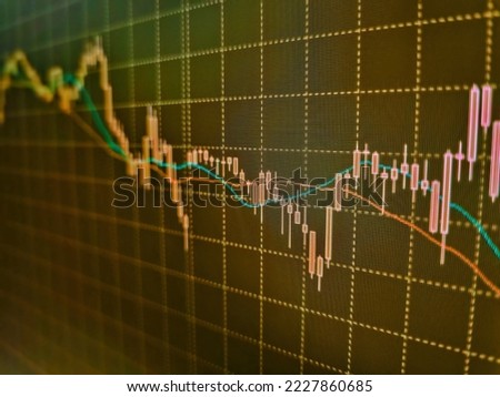 Thin focus. Display of quotes pricing graph visualization. Stock exchange background. Stock market graph and bar chart price display. Small depth of field. Share price quotes. Market Analyze. Forex